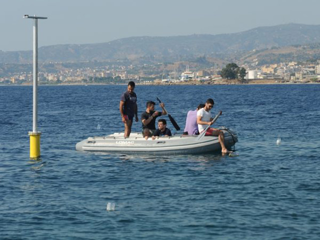 Intermediate-scale open-sea experiments on floating offshore wind turbines